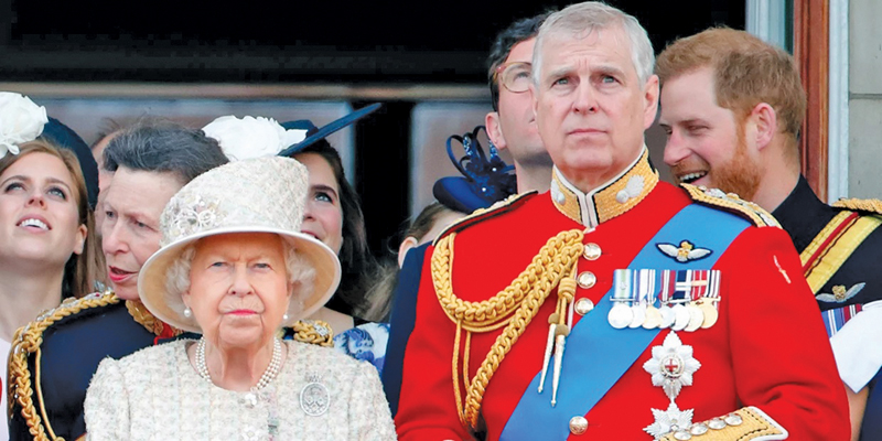Queen Elizabeth II and Prince Andrew, Duke of York (wearing the uniform of Colonel of the Grenadier Guards) watch a flypast from the balcony of Buckingham Palace during Trooping The Colour, the Queen’s annual birthday parade in London, England in this June 8, 2019 file photo.
