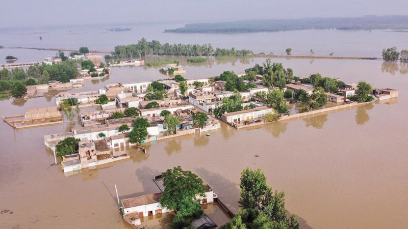 A general view of a flooded area after heavy monsoon rains is pictured from atop a bridge in Charsadda district in the Khyber Pakhtunkhwa Province of Pakistan on Saturday.