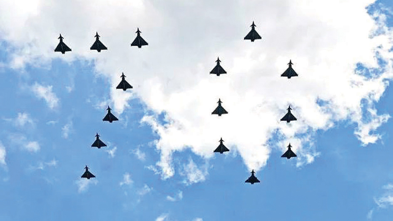 Fighter jets from Britain’s Air Force fly in formation to form the number ’70’ during a special flypast over the Buckingham Palace balcony following the Trooping the Colour, as part of Queen Elizabeth II’s Platinum Jubilee. 