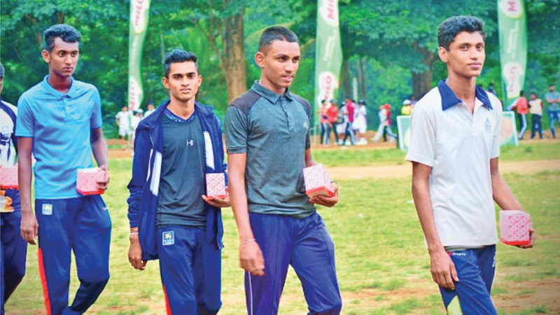 Vishva Vidusara Perera (extreme left) in the picture posed for a photograph with the other three members of the relay team after their event at the John Tarbet meet held in 2019. (Picture by Dilwin Mendis Moratuwa Sports Special Correspondent)