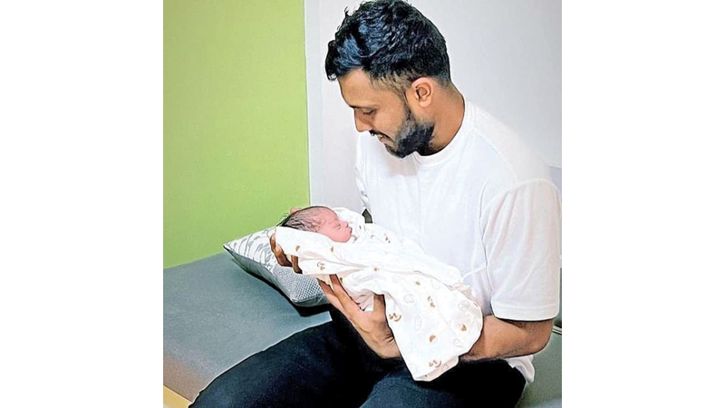 Kusal Mendis with his new born baby girl.