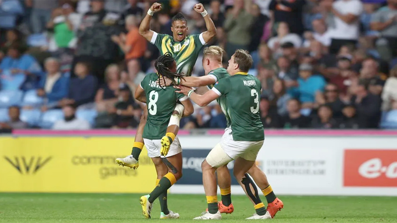 South Africa celebrate their victory over Fiji in the Commonwealth Games Rugby Sevens gold medal clash.