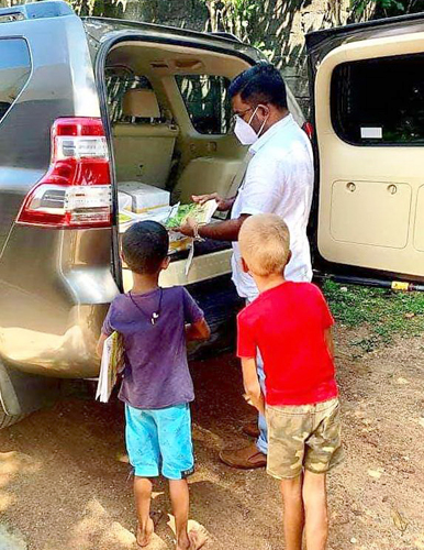 Dach Ayurvedic Hospital distributes books to schools