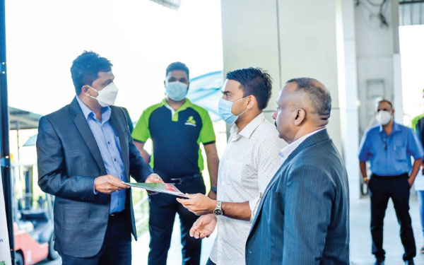 Minister Namal Rajapaksa, High Commissioner Kananathan with Upali Weerakoon MD of Bio Substrate flagging off the maiden shipping of Coco peat export consignment to Kenya at the Port of Colombo.