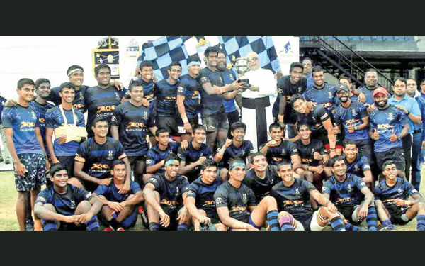 S. Thomas’ Rugby Team celebrate with the Archibald Perera Memorial Trophy