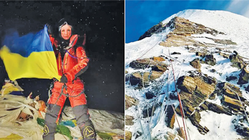 Russian mountaineer and blogger Katya Lipka unfurls the Ukrainian flag on Mount Everest.