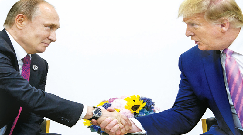 A file photo of former US President Donald Trump (R) meeting with Russia’s President Vladimir Putin during the G20 summit in Osaka, Japan on June 28, 2019.
