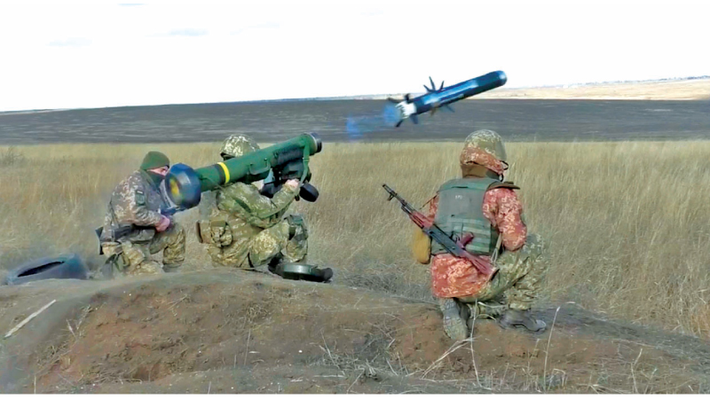 A Ukrainian soldier fires a U.S.-made Javelin missile.