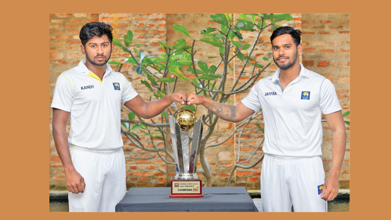 Two captains Kamindu Mendis (Kandy) and Dhananjaya de Silva (Jaffna) with the champion trophy. (Picture courtesy  SLC)