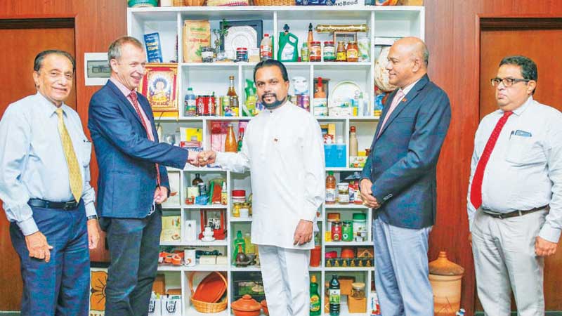 Minister Wimal Weerawansa with officials at the event