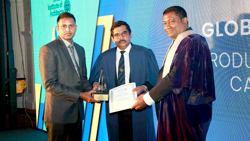 Wickram Production Manager from Global Vinyl receives the award.