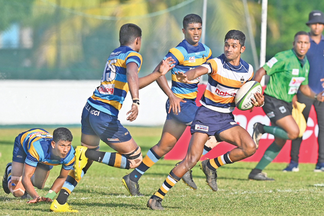 Action from the match between St. Peter’s and Vidyartha