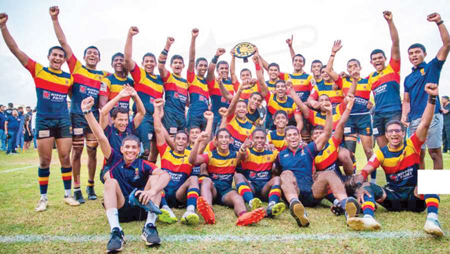 Trinity Team celebrate with the Canon R. S. De Saram Shield