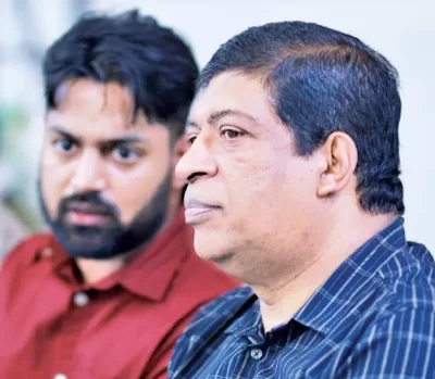 Arshan Ashraf with former Finance Minister Ravi Karunanayake  