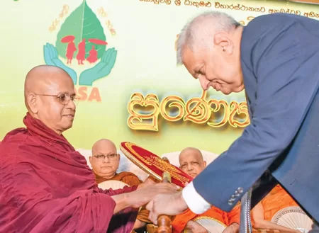 President presenting the Vijinipatha to Ven. Pitigala Sonuttara Thera