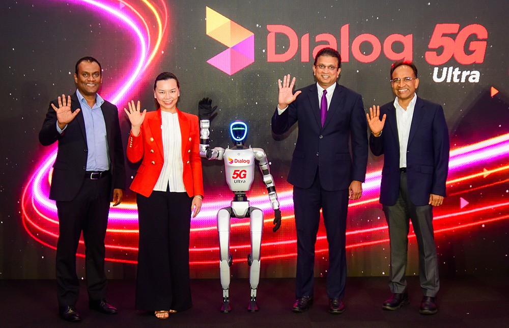 Left to right: Ranga Kariyawasam, Group Chief Technology Officer, Dialog Axiata PLC; Lim Li San, Group Chief Operating Officer, Dialog Axiata PLC; NOVA, the Humanoid Robot Powered by Dialog 5G Ultra; Supun Weerasinghe, Director / Group Chief Executive, Dialog Axiata PLC; Munesh David, Group Chief Commercial Officer & Acting Group Chief Financial Officer, Dialog Axiata PLC